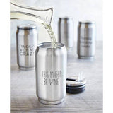 Shiny stainless steel can with THIS MIGHT BE WINE text, liquid pours into it from a glass carafe on a wooden surface.