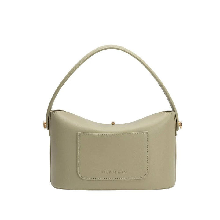 Beige recycled vegan leather crossbody bag with curved top, single top handle, front patch pocket, gold hardware.