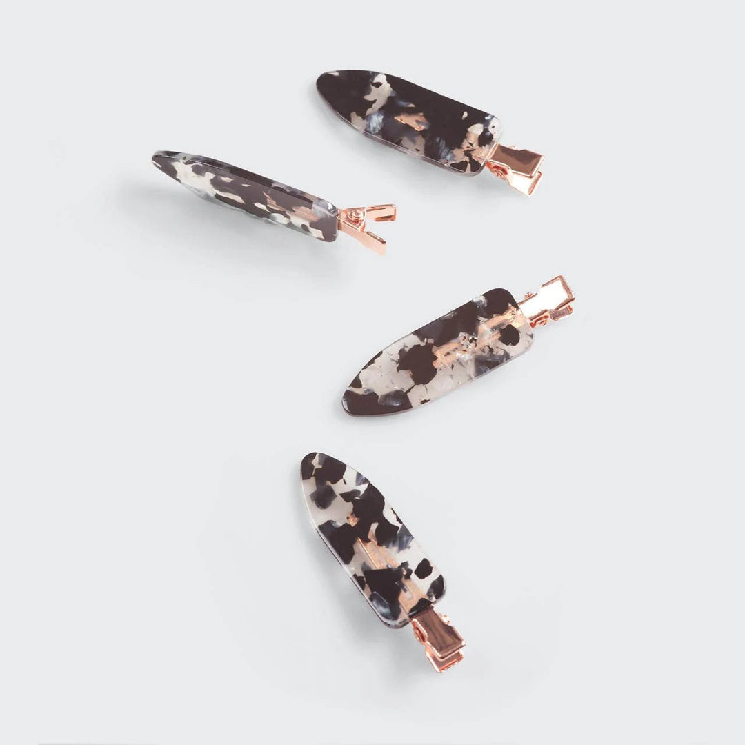 Eco-Friendly Creaseless Clips 4pc set in black terrazzo with rose-gold hardware.