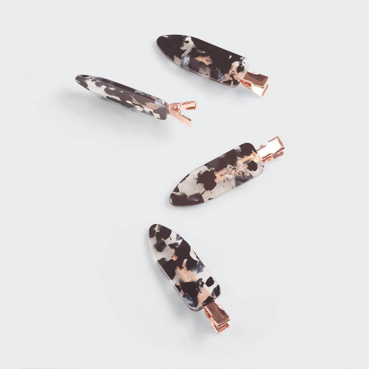Eco-Friendly Creaseless Clips 4pc set in black terrazzo with rose-gold hardware.