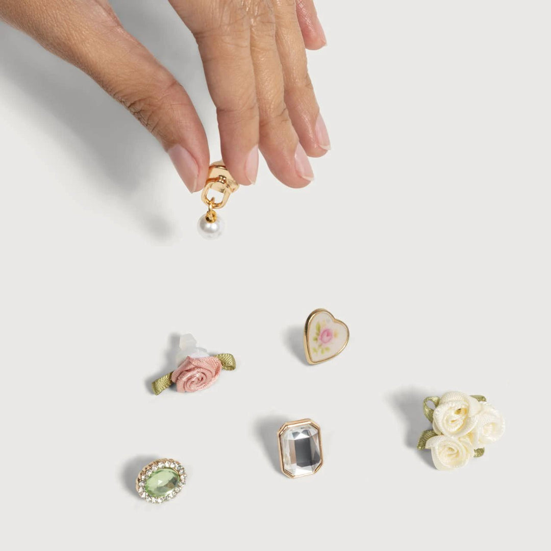 KitschPop 6pc charm set, vintage ivory; gold-tone charms with pearl drop, enamel heart, pink rose, and green gem halo