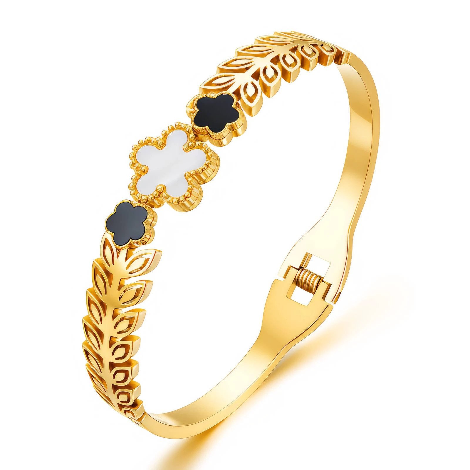 Gold 18K-plated stainless steel bracelet with white and black enamel flowers and leafy pattern, hinged clasp.