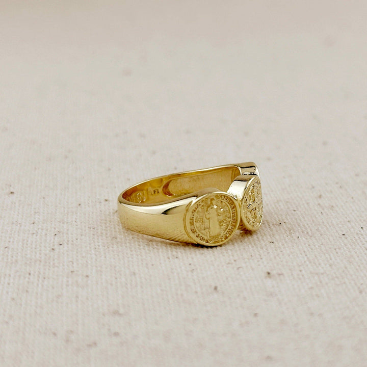 18k gold-filled signet ring with three round Saint Benedict medals on a polished band.