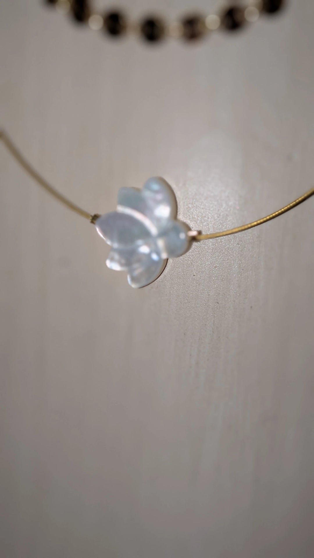 The White Lotus Necklace by Mar&amp;Ella; gold chain with translucent lotus pendant