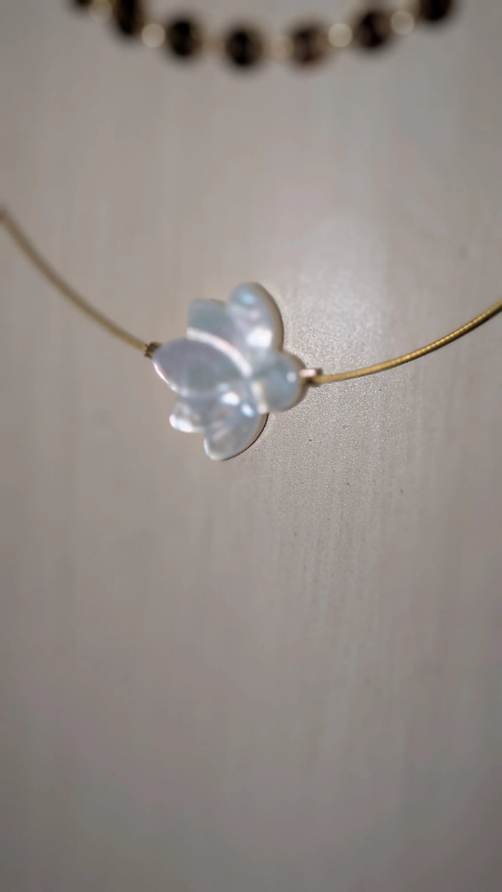 The White Lotus Necklace by Mar&amp;Ella; gold chain with translucent lotus pendant