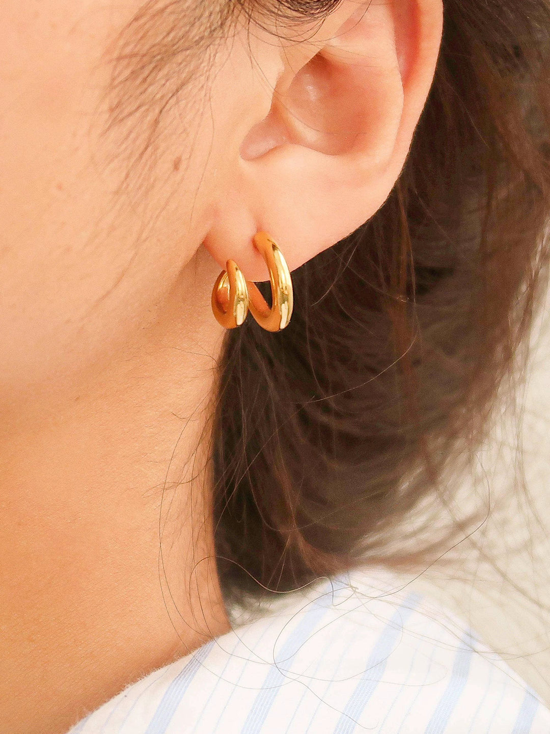 Maddison-Gold non-tarnish double C hoop earrings, gold-tone pair worn on the ear