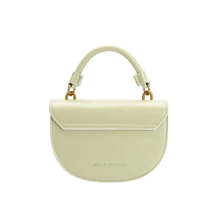 Mint green recycled vegan leather crossbody bag with curved flap, top handle and gold hardware, Melie Bianco logo.