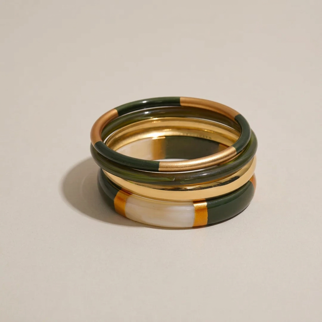 Camille bangles with a warm plain background