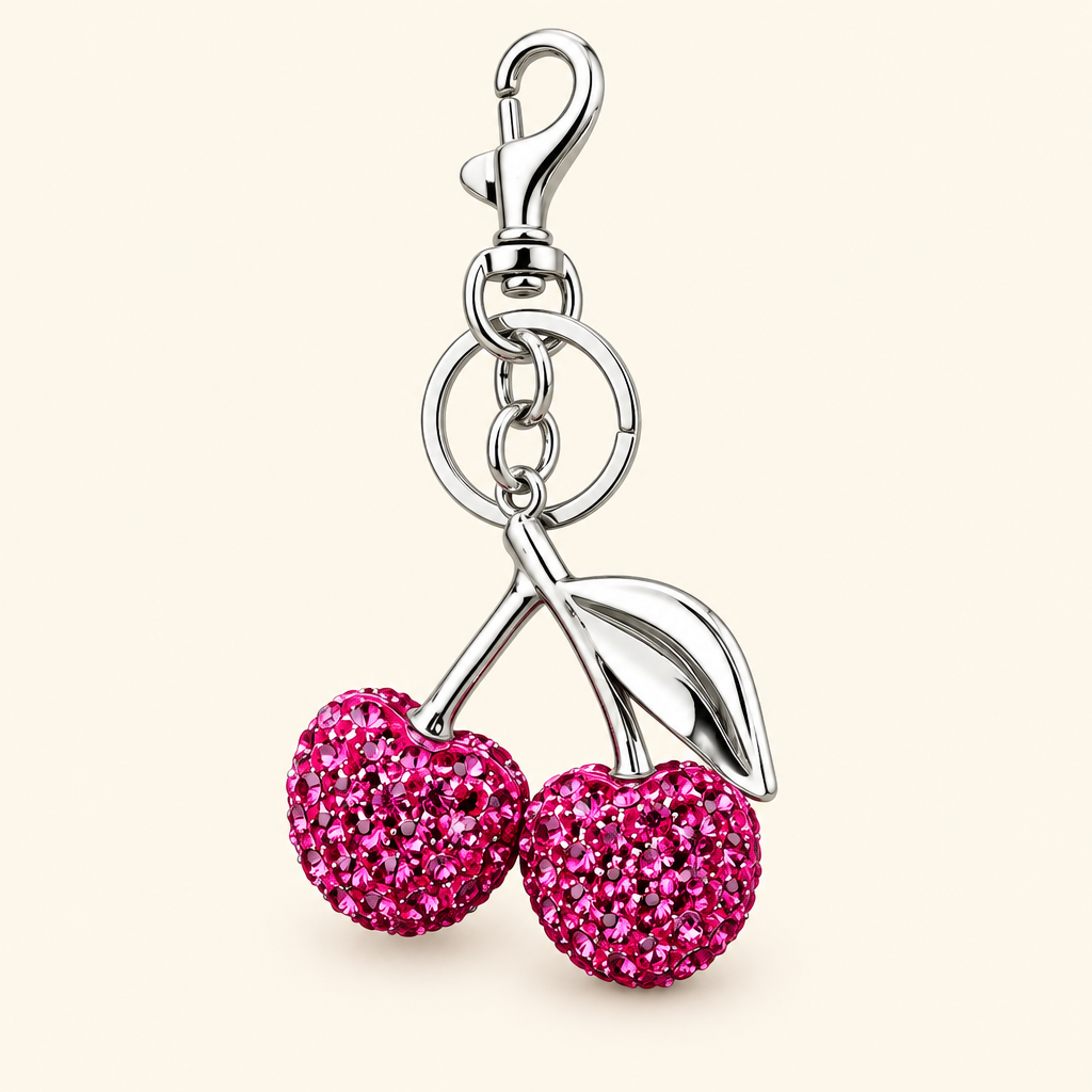 Cherry charm alone on an ivory background