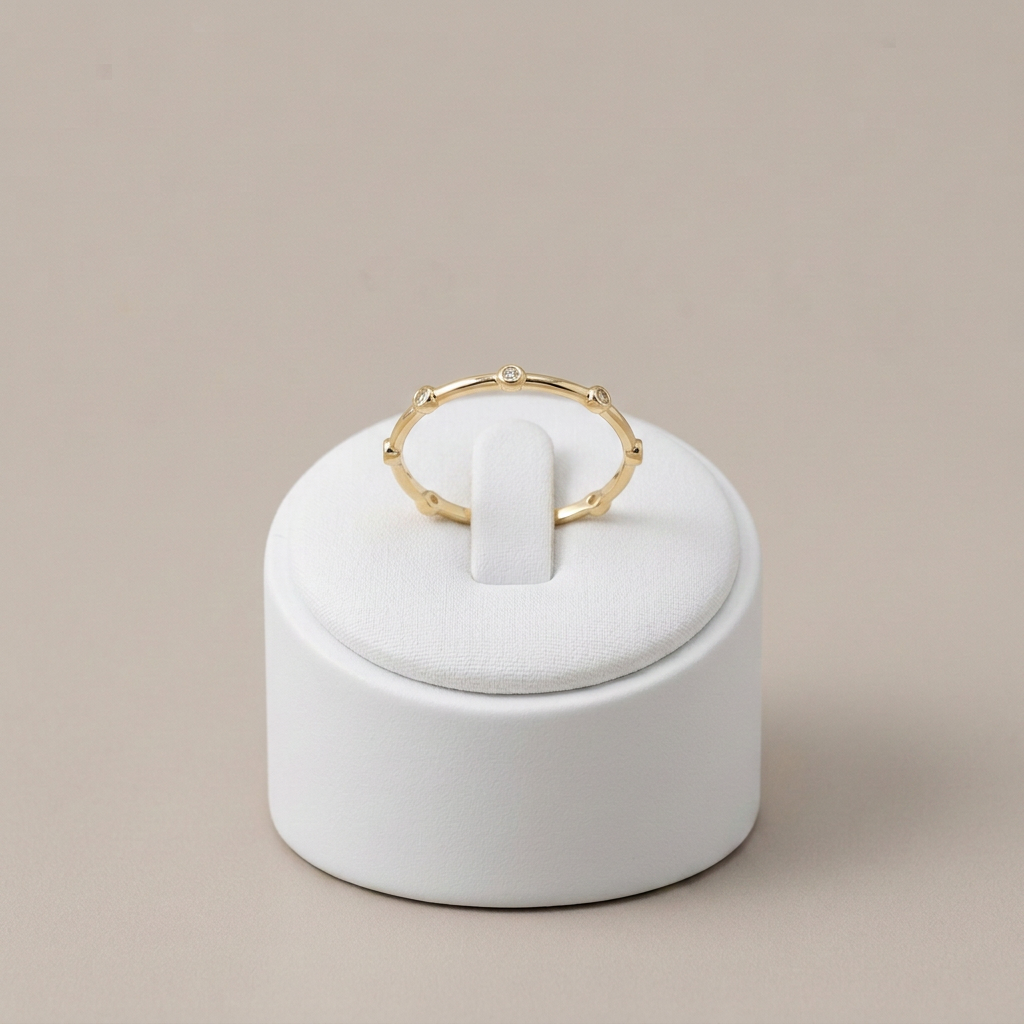 CZ dots ring on the matching white ring stand