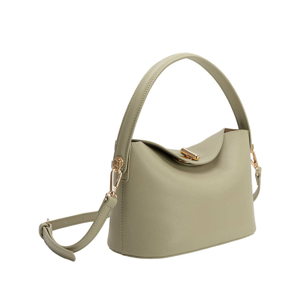 Mint green recycled vegan leather crossbody bag with top handle, curved flap closure, and gold-tone hardware.
