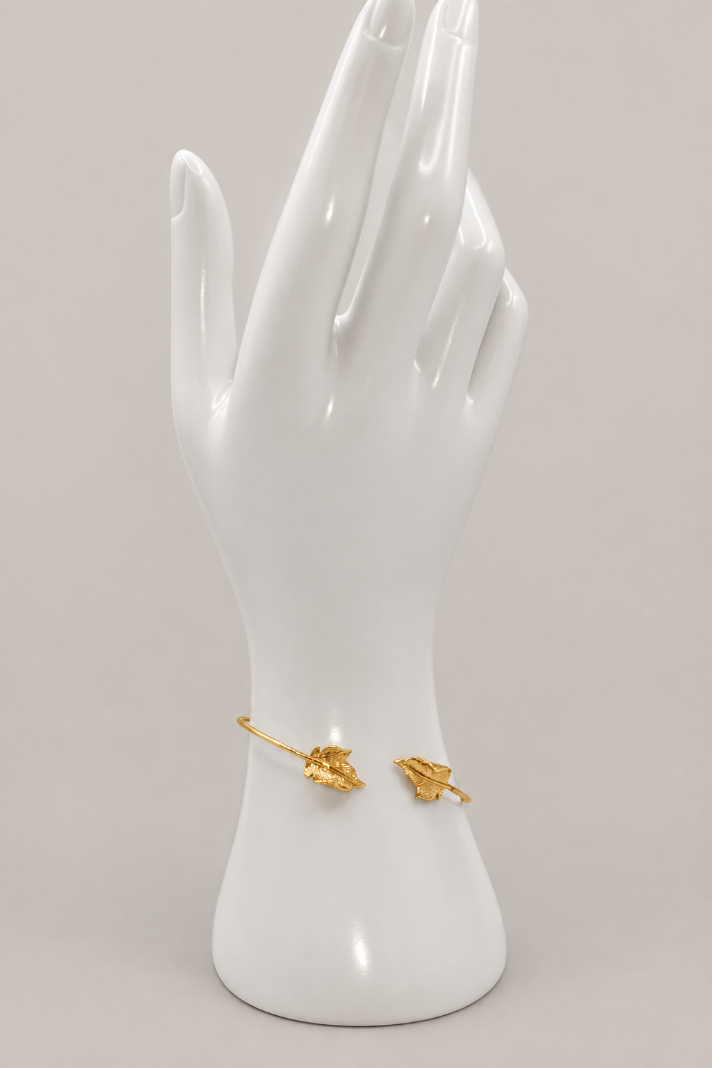 Gold Leaf Bracelet with a matching warm-gray background