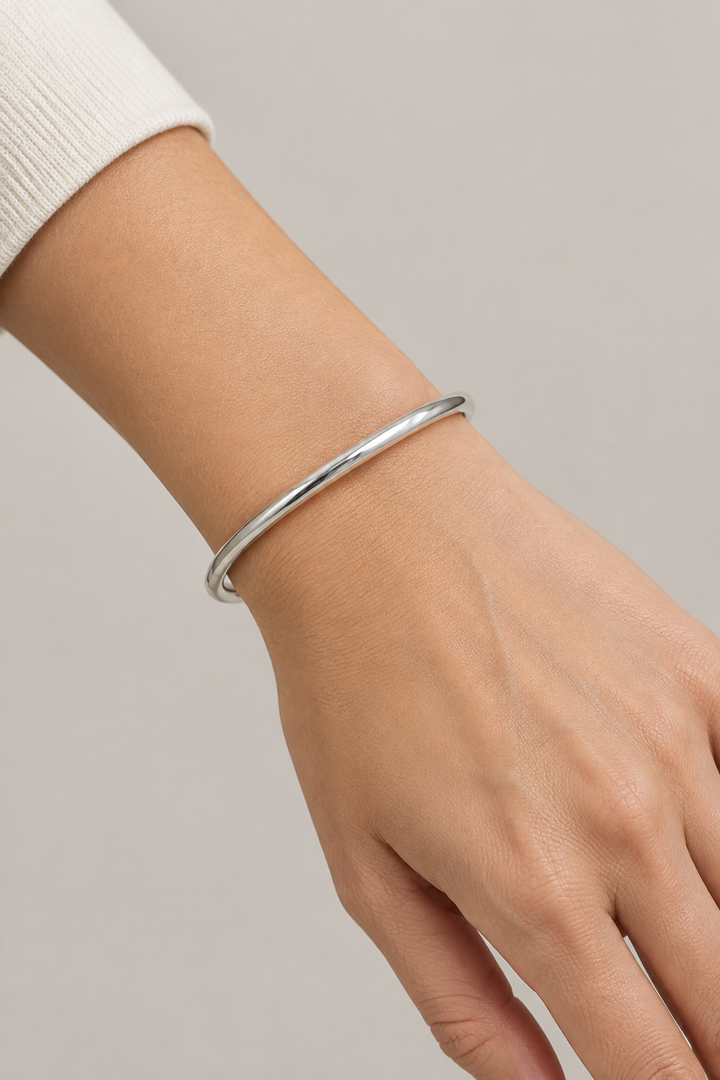 Paros Silver Bangle worn on a wrist