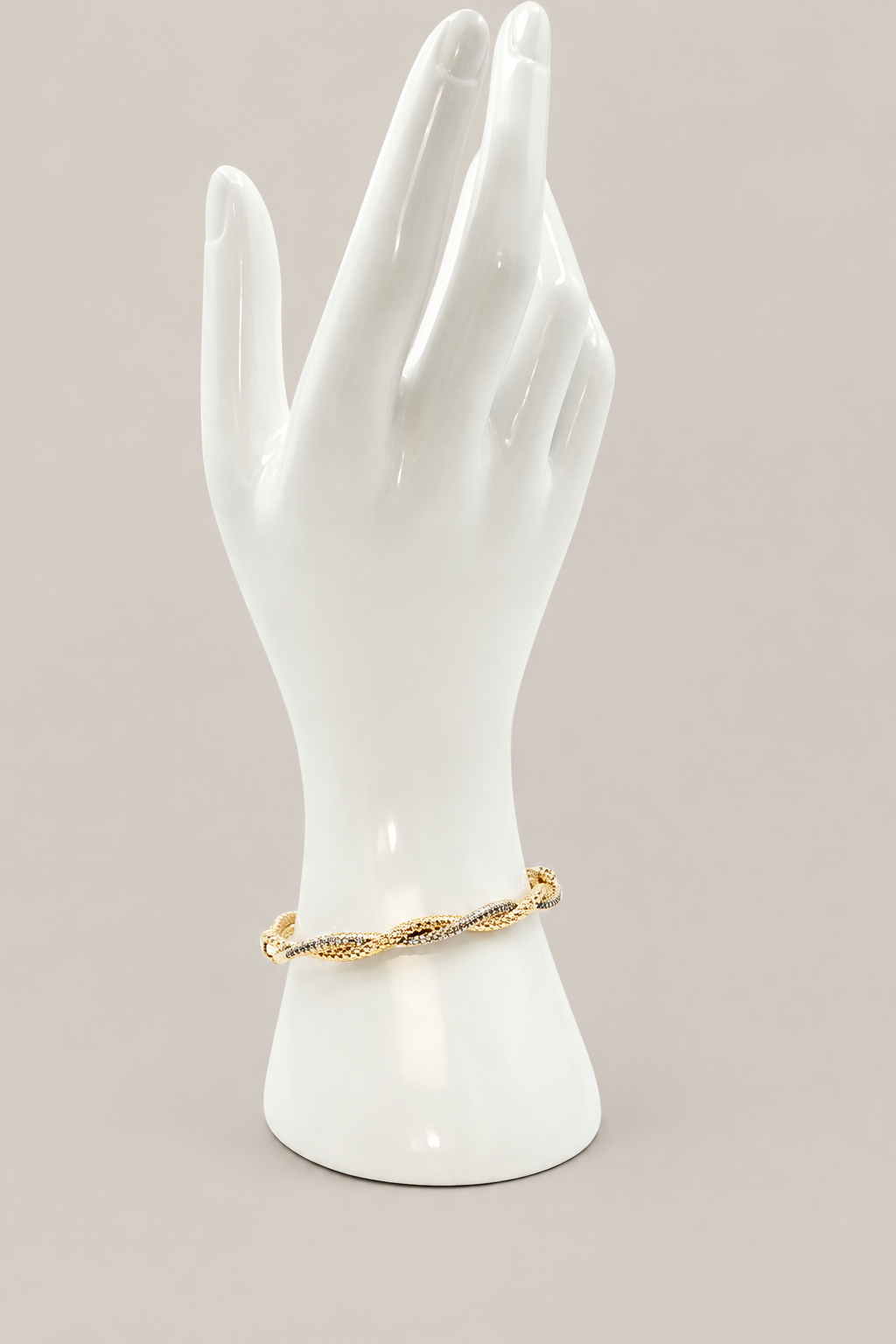 Pave Twist Bracelet with a matching warm-gray background