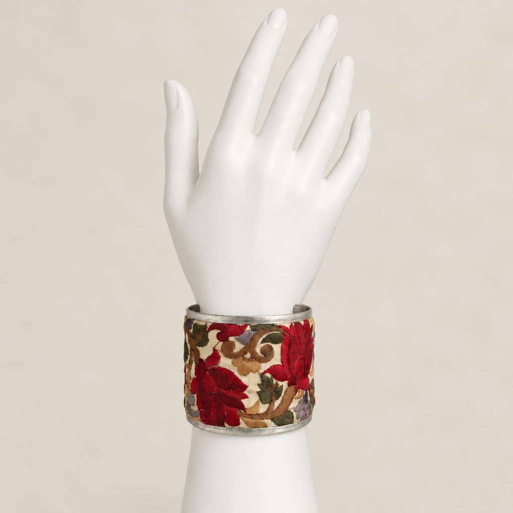 Red cuff on white display hand with matching background