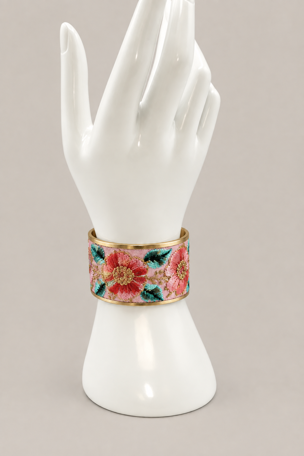 Soft Pink Floral cuff on a matching white display hand