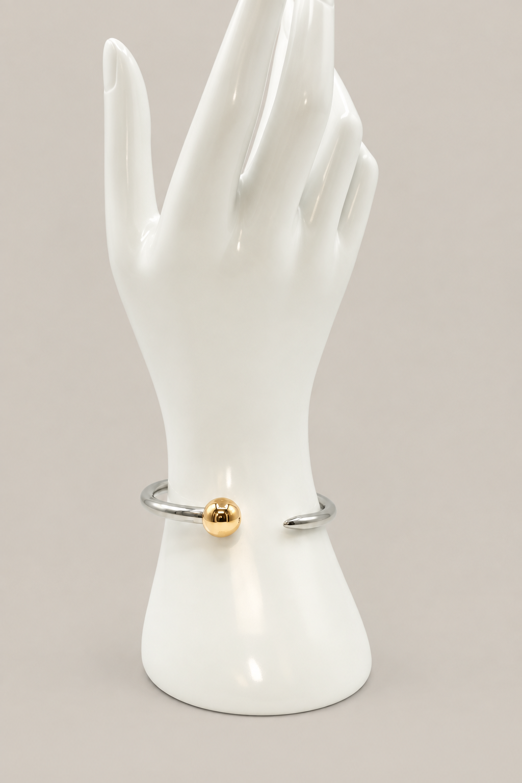 Stevie Nail Cuff with a matching warm-gray background