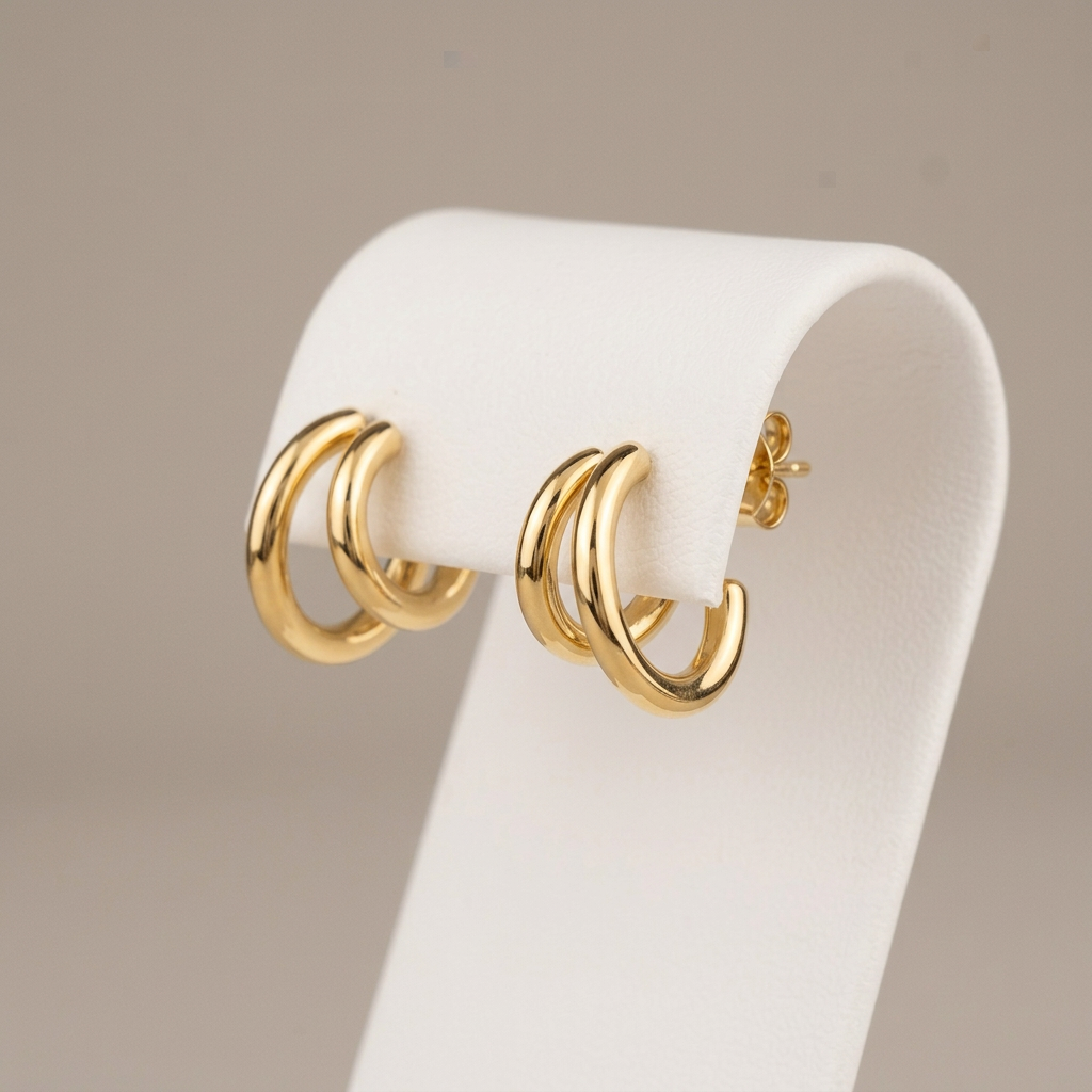 Three-quarter view of Maddison earrings on the white stand