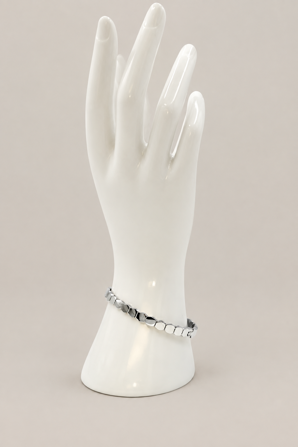 Twisted Chain Bracelet with a matching warm-gray background