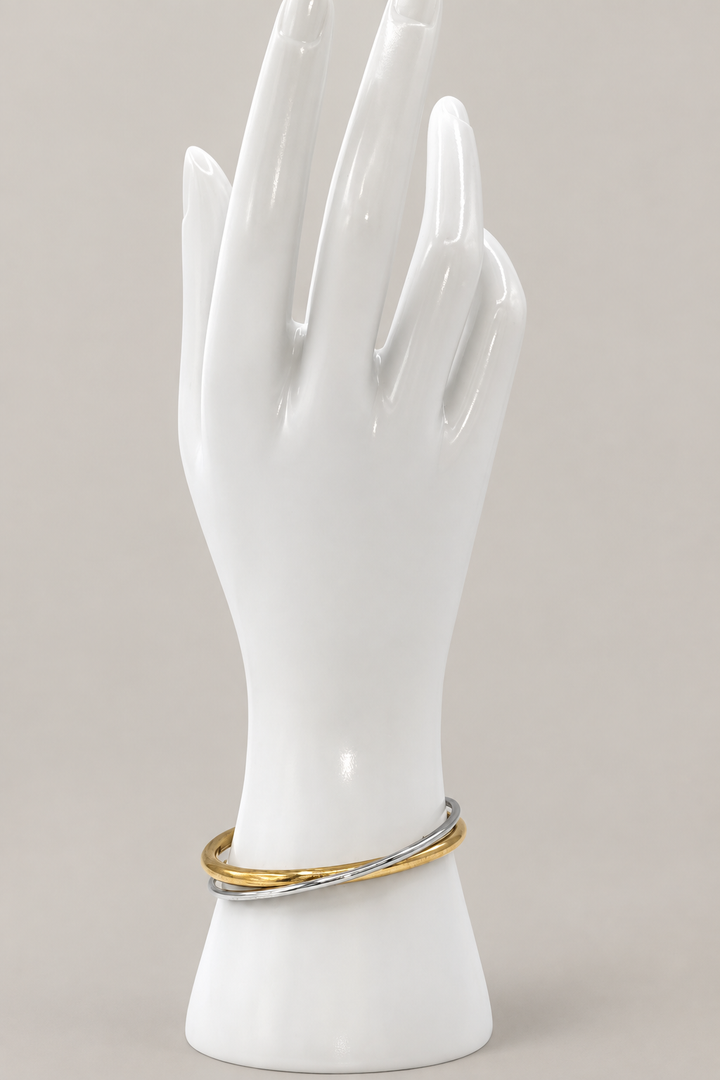 Upright Rivoli bracelet with a matching warm-gray background